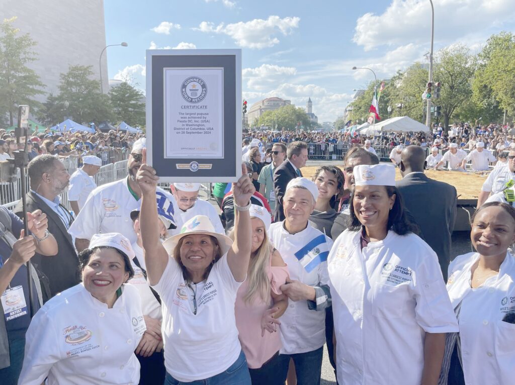 Group of chefs holding Guinness World Record certificate